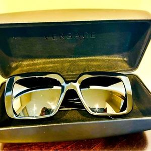 Black Versace sunglasses with bling detail on the sides